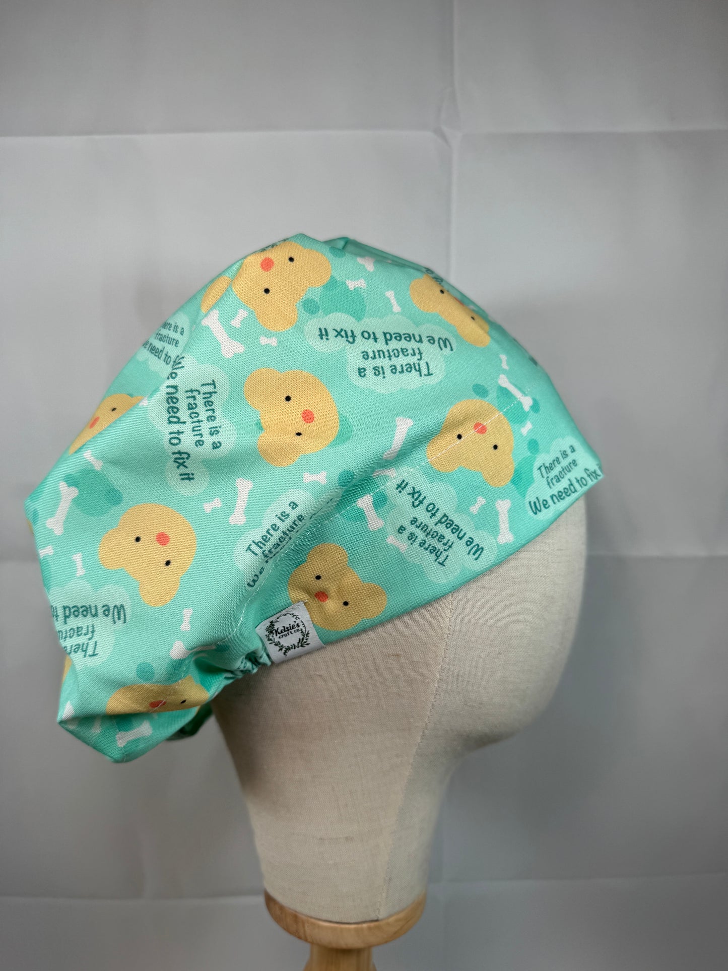 There is a Fracture We Need to Fix It Scrub Cap - Satin Lining Available - Multiple Styles