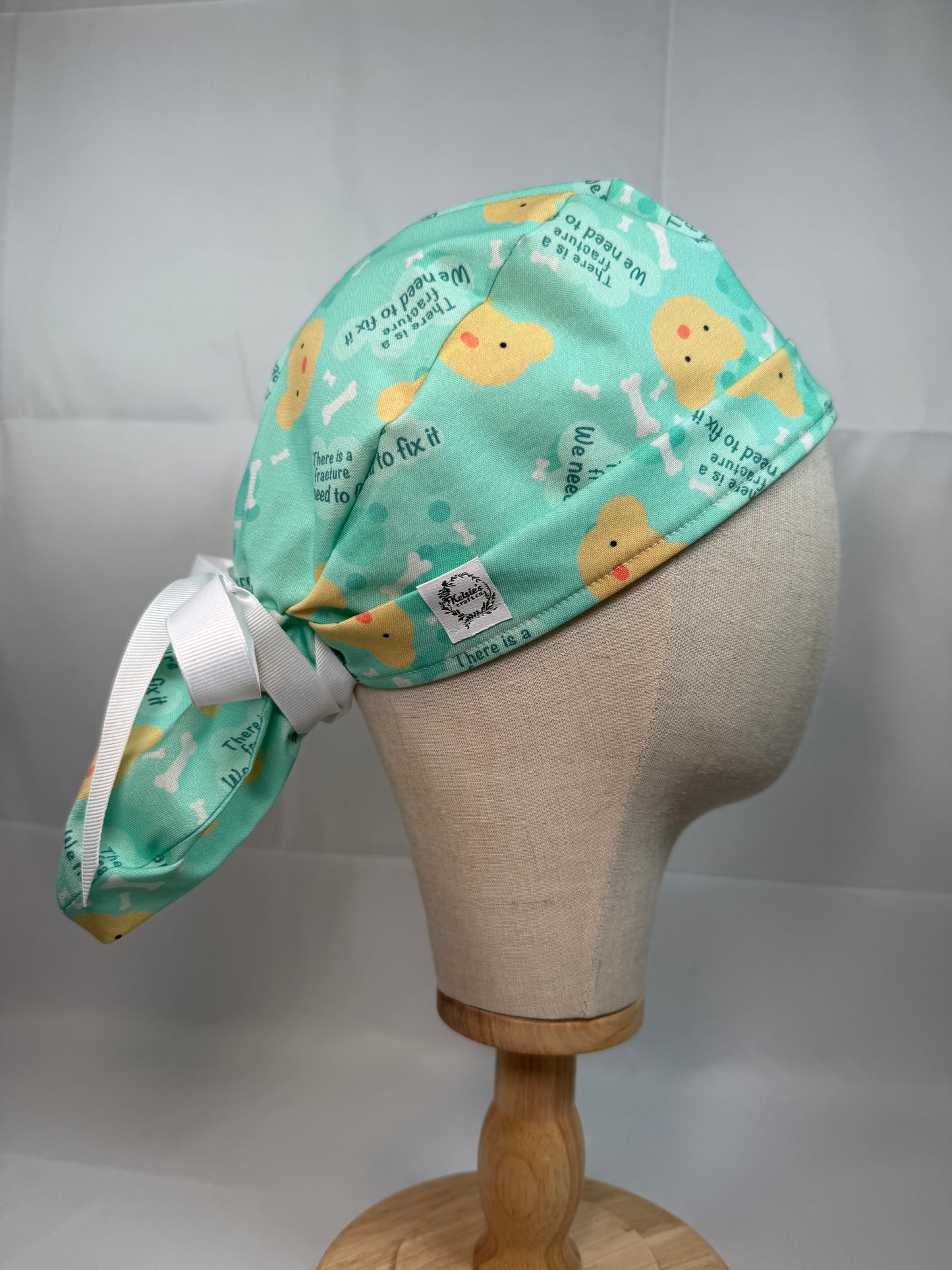 There is a Fracture We Need to Fix It Scrub Cap - Satin Lining Available - Multiple Styles
