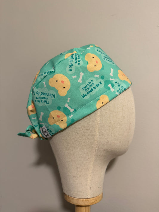There is a Fracture We Need to Fix It Scrub Cap - Satin Lining Available - Multiple Styles