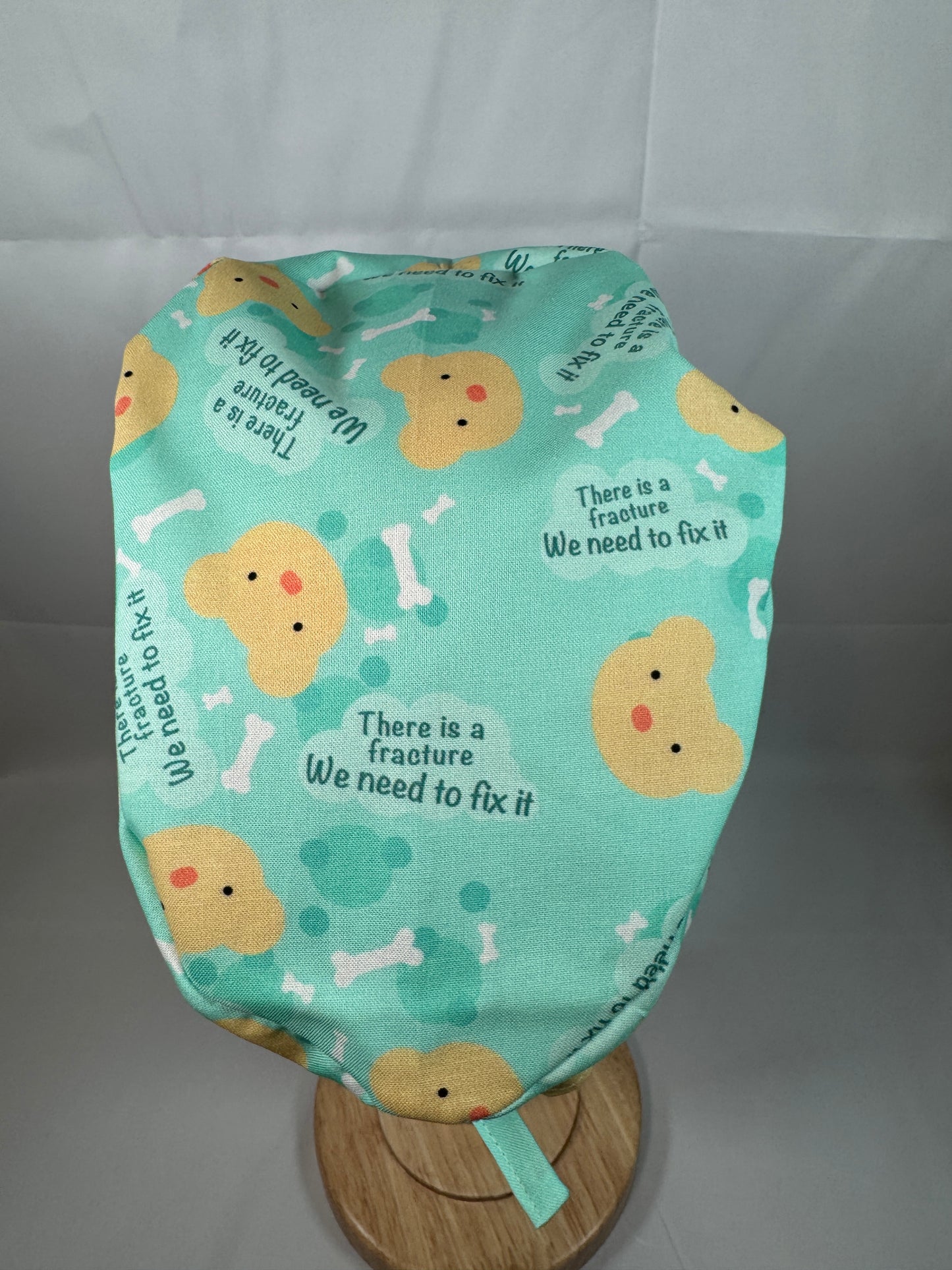 There is a Fracture We Need to Fix It Scrub Cap - Satin Lining Available - Multiple Styles