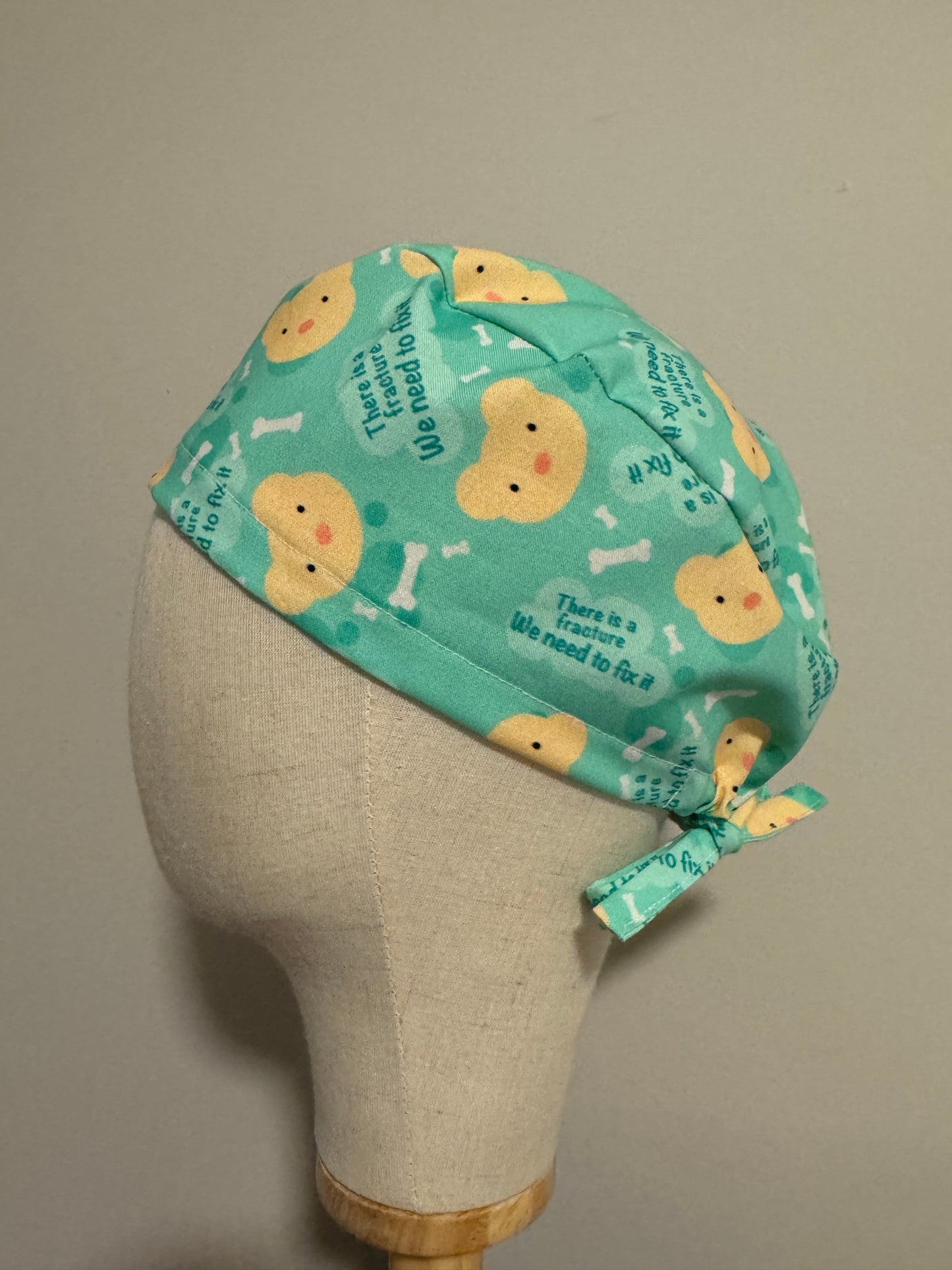 There is a Fracture We Need to Fix It Scrub Cap - Satin Lining Available - Multiple Styles